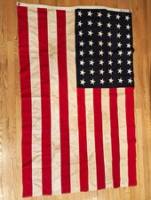 Vintage 48-star American flag manufactured by Annin & Co. under the Defiance picture