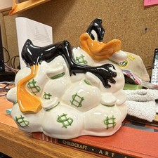 1995 Warner Bros. Looney Tunes Daffy Duck Ceramic Money Bag Coin Bank picture