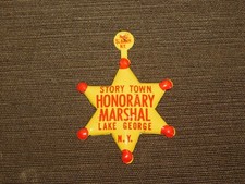 100 VINTAGE 1960-70S  HONORARY MARSHAL BADGE  STORY TOWN LAKE GEORGE NY UNUSED picture