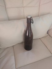 ANTIQUE-EARLY 1900S- BROWN-GLASS BOTTLE WITH WIRE, RUBBER SEAL & CERAMIC STOPPER picture