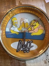 The Simpsons Duff Beer animated wall clock picture