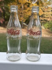 For 2 Coca-Cola bottles 250 ml dated 2005 The Coca-Cola Company picture
