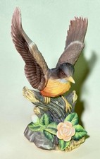 Porcelain Robin Figurine With Flower 7 5/8'' H Excellent Condition picture