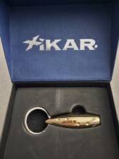 Xikar Twist Bullet Punch #007 NIB Brass Plated Gold Color picture