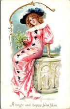 A Bright and Happy New Year Postcard Woman Wearing Pink Holding Flowers picture