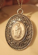 Lovely Swirl Rim Etched Spanish Our Lady of Divine Providence Medal Necklace picture