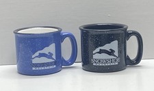 Pair of Snowshoe Mountain Coffee Mugs Blue Black White Rabbit Logo 14 oz picture
