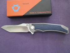 Six leaf  full titanuim and  blue layerd scales picture