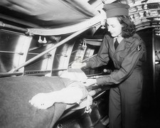 Nurse Aboard an Air Evacuation Flight 8x10 Glossy Photo Print HT413629 picture