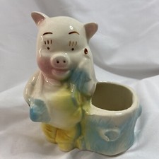 VINTAGE PIG FARMER RESTING ON TREE STUMP PLANTER ART POTTERY picture