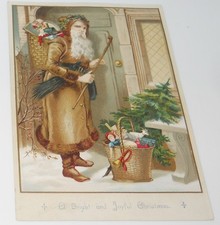 SCARCE ANTIQUE CHRISTMAS TRADE CARD SANTA CANE BASKET TOYS DOORWAY SNOW TREE picture