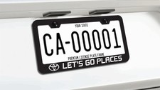 Toyota Place Let's Go Places Dealership License Plate Frame Metal picture