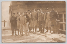 RPPC Men standing on Bridge in the Snow c1905 Real Photo Postcard picture