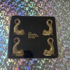 The Metropolitan Museum of Art 4 Gold Finish sea serpent qoi fish statue - Boxed picture