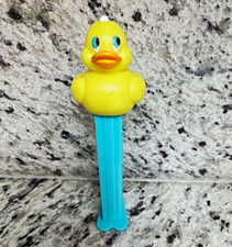 PEZ Yellow Duck Silo relic Candy Dispenser with Blue Stem picture