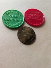 CASINO TOKENS, JOHN ASCUAGA'S NUGGET, CLUB CAL NEVA IN RENO picture