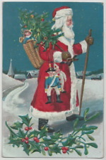 Long Red Robe Santa Claus in Snow with Toy Basket~1910 Christmas Postcard~k416 picture