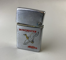 Winchester Western Rifles  Brown & Bigelow Wind Master Lighter 1950s Rare picture