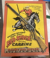 VINTAGE 12x16 in DAISY AIR RIFLE COWBOY RED RIDER ADV SIGN TIN METAL.  picture