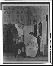 Photo:1940s Interior Couple Domestic Scene Woman Sewing Man Standing picture