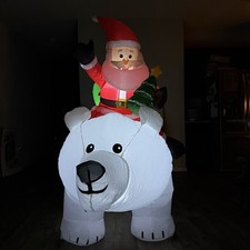GOOSH 6ft Light-Up Inflatable Santa Riding Polar Bear Christmas Yard Decoration picture