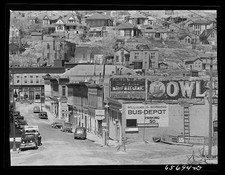 Photo:Central City Colorado 1942 Main Street Bus Depot Owl Saloon Cars picture
