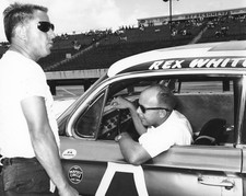Jim Rathmann checks out cockpit of Rex White�s NASCAR Cup Chevrole- Old Photo picture