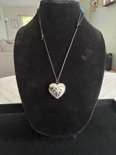 Avon - Outspoken by Fergie, Fleur de Lis locket with solid perfume (heart-shape) picture