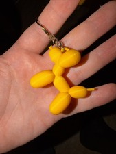 3D Printed Yellow Dog Balloon Keychain picture