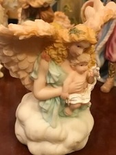 LOVELY ANGEL ROMAN INC SERAPHIM LOVING SPIRIT BABY DOVE 1996 MUSIC BOX picture