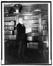Andrew Carnegie Library Interior 1900s Portrait Standing in Bookshelf Room picture