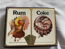 vintage Waddington's playing card set designs of a Coca-Cola  and a rum cocktail picture