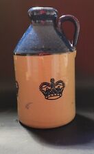Stoneware bottle with blue top and crown motif. 14.5 cm picture