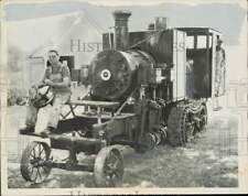 1959 Press Photo Ray and Ed Smolik pose with locomotive used to haul logs, Iowa picture