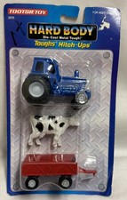 Vintage 1992 Tootsie Tough Hitch Tractor & Cow picture