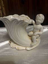 This item is a vintage Relpo cherub cornucopia planter (model 5295) picture