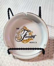 The Fairmont Hotels White Ceramic Ashtray Gold Trim Black Logo  Vintage picture