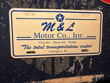 Plastic Dealership License Plate M & L  Chrysler Plymouth Dodge Lexington NC picture