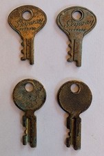 Set of four vintage Mid-Century luggage keys.  Two are Skyway Luggage #1830. picture