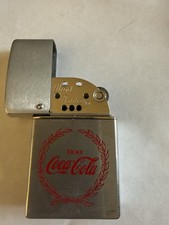 Vintage Coca-Cola advertising Oil Lighter With Laurel Wreath Motif picture