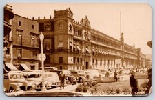 The National Palace or Palacio Nacional in Mexico City with 1950s Cars RPPC picture
