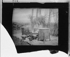 Photo:Ainu Man Japan 1900s Outdoor Clay Pots Containers Seated on Mat picture