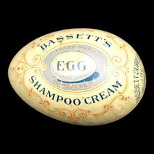 ANTIQUE BASSETT’S EGG SHAMPOO CREAM ADVERTISING TIN, ROCHESTER, NEW YORK 1906 picture