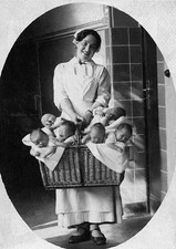 Midwife P. Schmauder with a 6 babies in a basket Historic Old Photo picture