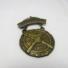 Vintage NRA Bronze Pro-Marksman Sharpshooter 50 FT Award Badge Pin Blackinton picture