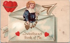 1909 Valentines Postcard- Unsigned Clapsaddle- Girl in Envelope Pierced by Arrow picture
