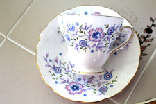 FINE BONE CHINA BLUE BLOSSOM CUP AND SAUCER MADE IN ENGLAND FOR AVON 1974 picture
