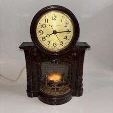 MASTERCRAFTERS Model 272 FIREPLACE  Lighted Motion Clock 1950's WORKS Time+Light picture