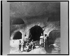 Photo:Syracuse Sicily 1943 Family in Catacombs Refugee Shelter WWII picture