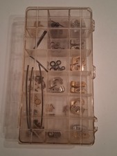 Vintage Evans lighter repair parts kit. NOS shiny pieces in chrome and gold fin picture